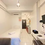 Cozy Studio Room At Grand Asia Afrika Apartment By Travelio