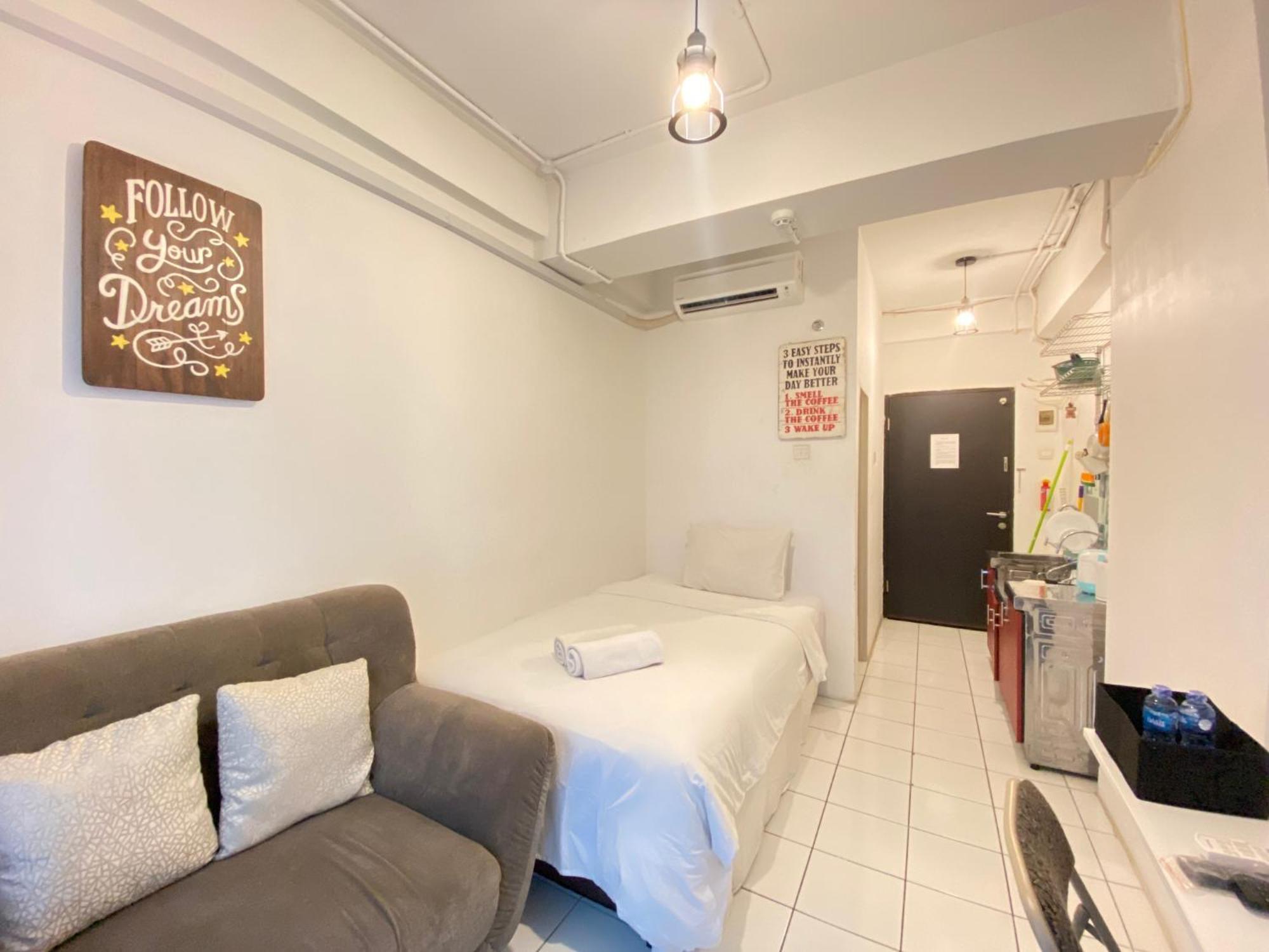 Cozy At Grand Afrika By Travelio *