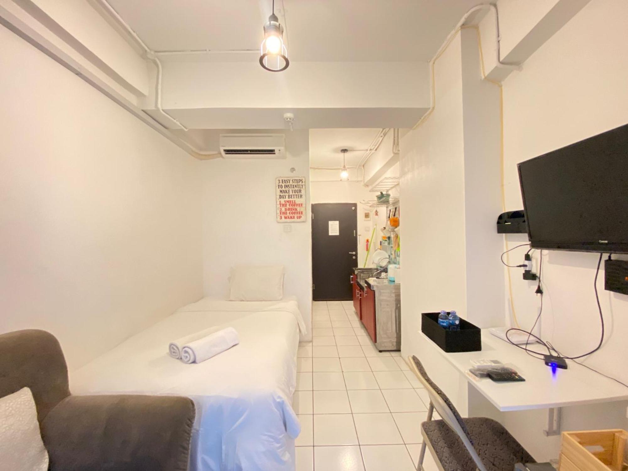 Apartemen Cozy At Grand Afrika By Travelio