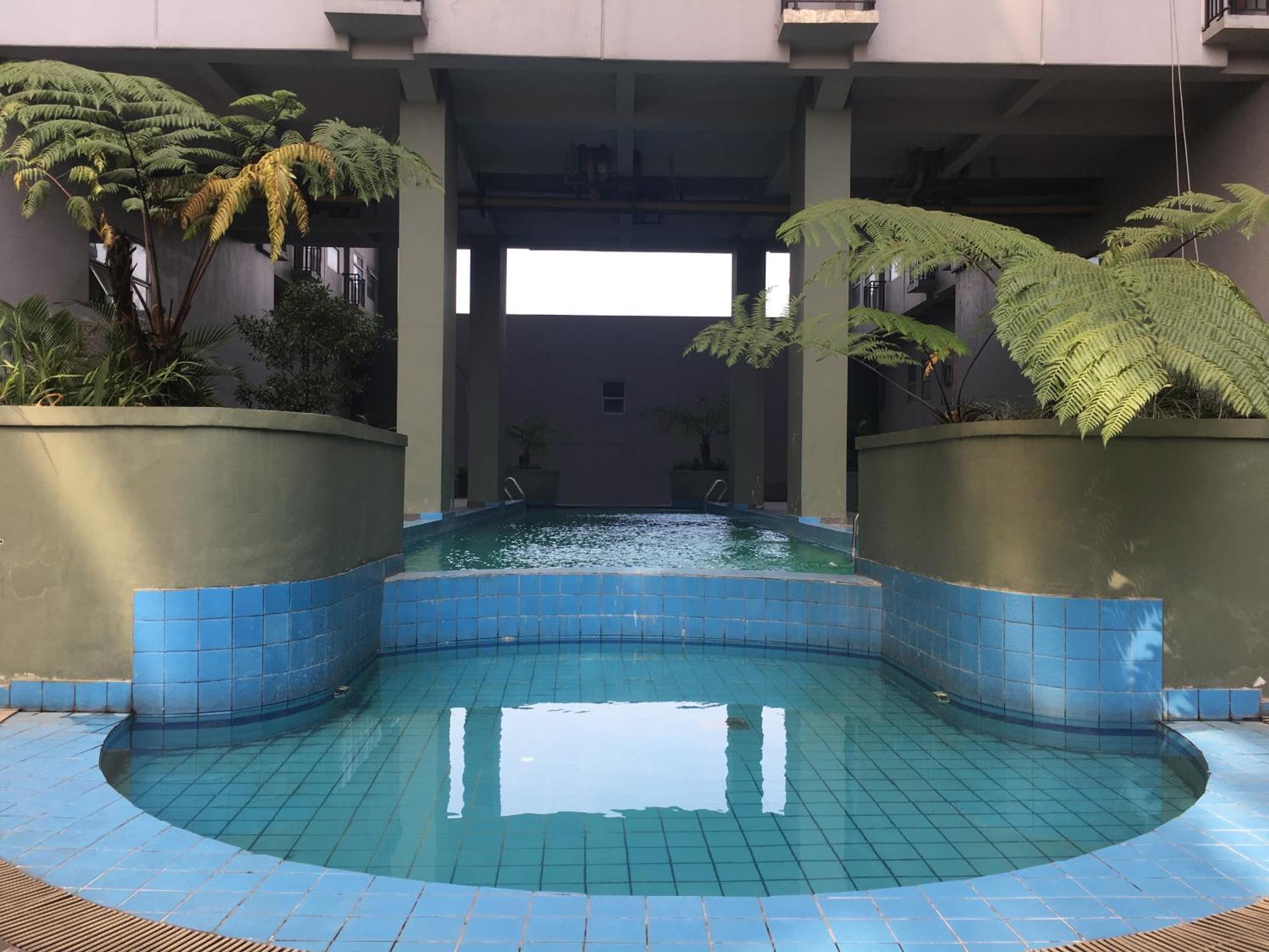 Apartemen Cozy At Grand Afrika By Travelio *